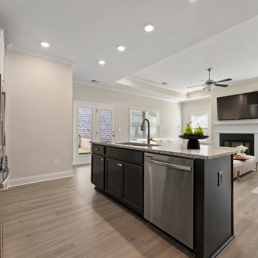 a kitchen with black appliances