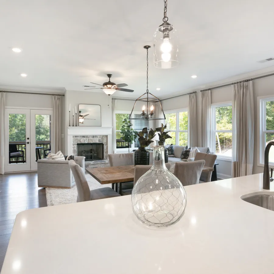 a dining room table in front of a window
