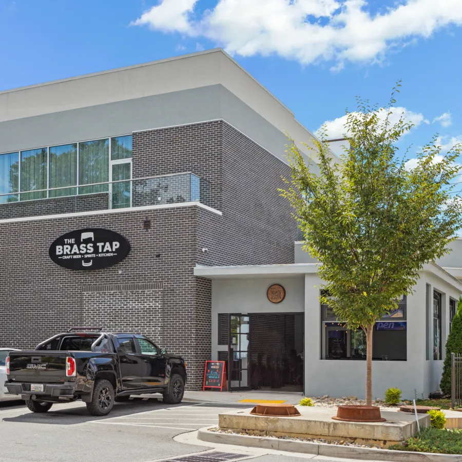 a building with cars parked outside