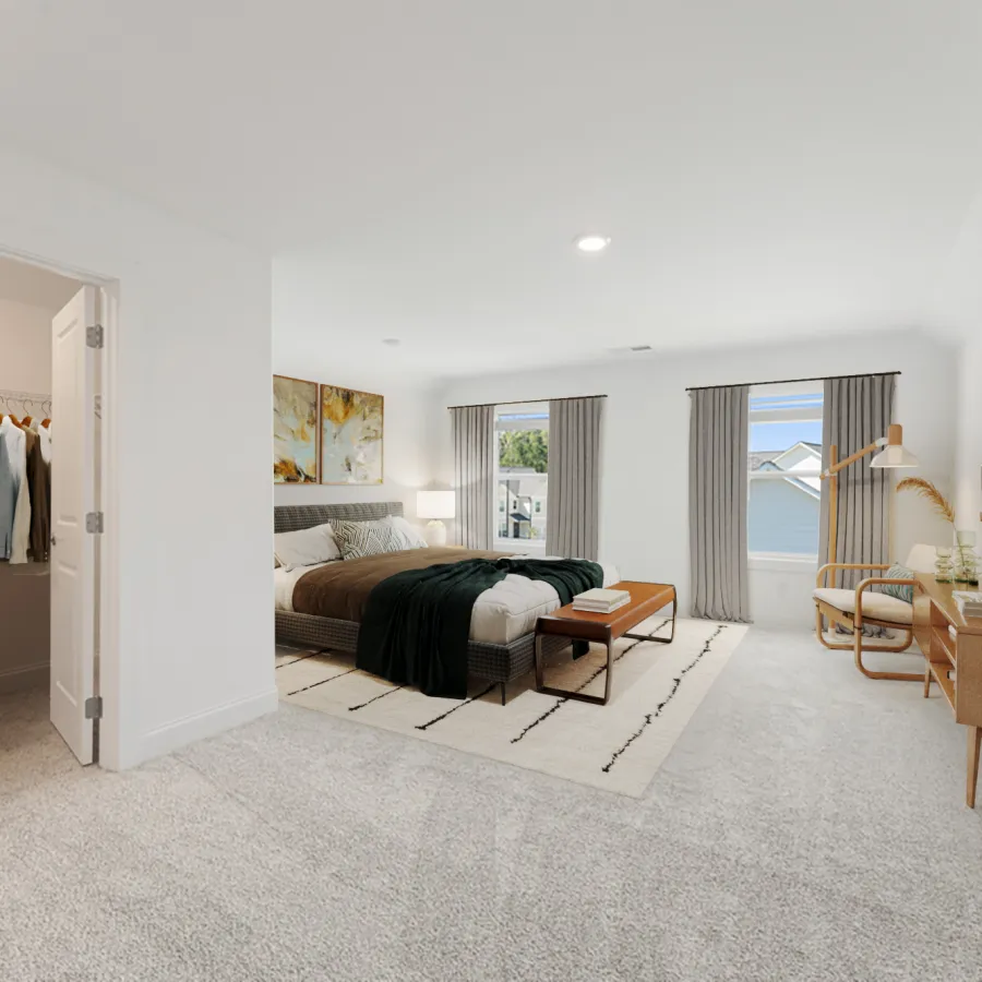 Spacious modern bedroom with large bed, neutral decor, walk-in closet, and natural light from two windows.