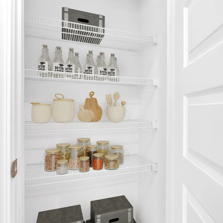 Organized pantry with glass jars, baskets, and storage boxes for efficient kitchen storage.