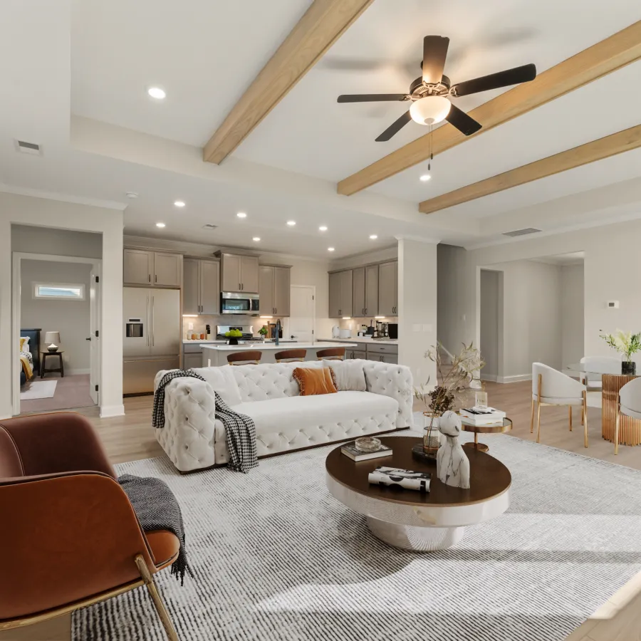 a living room with a large chandelier and a couch