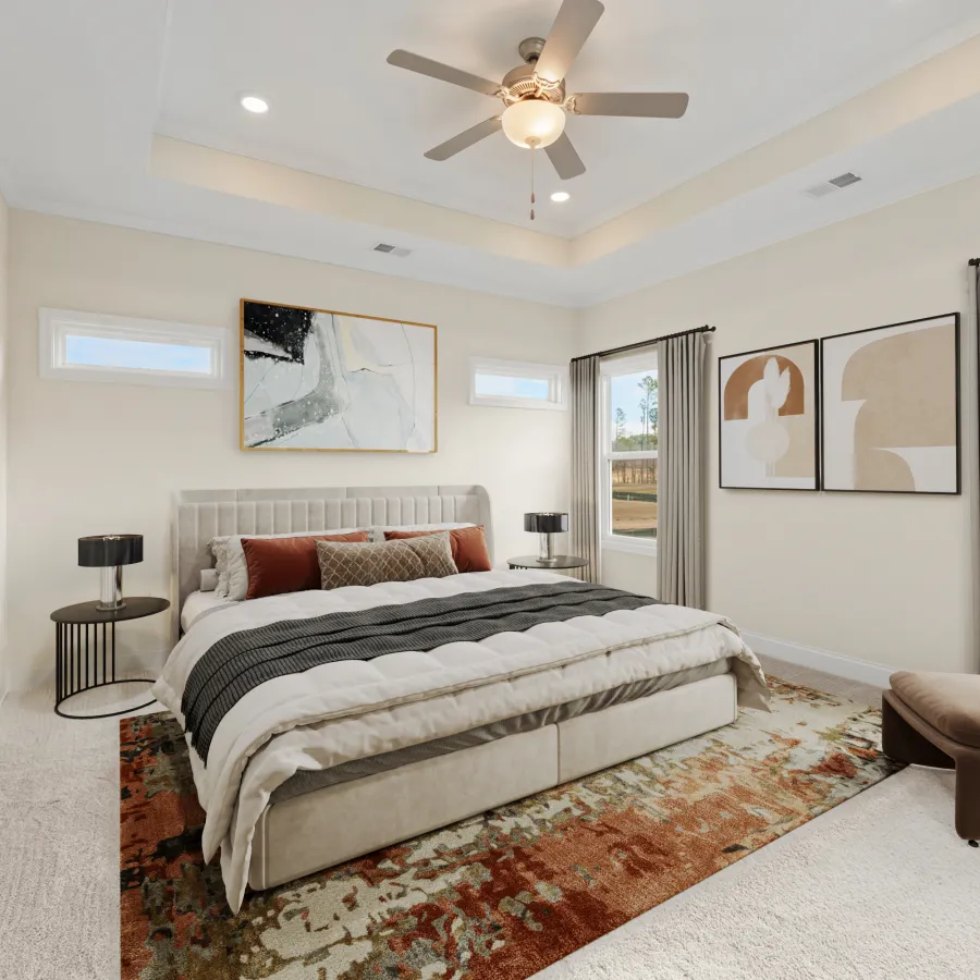 a bedroom with a large bed and a large window