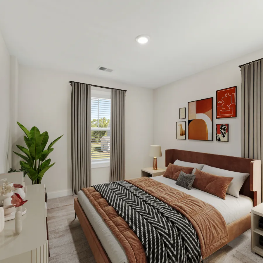 a bedroom with a bed and a table