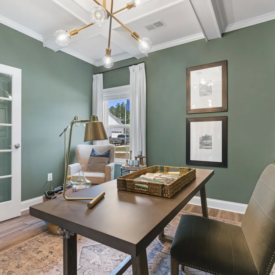 a room with a table and chairs