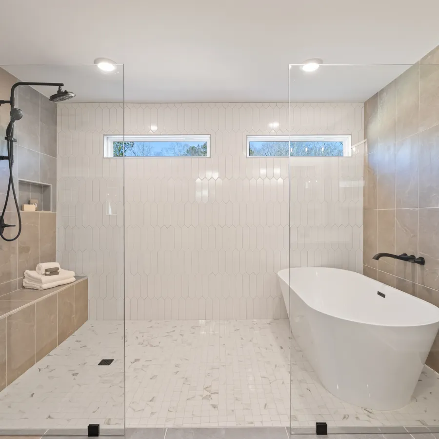 a bathroom with a bathtub and toilet