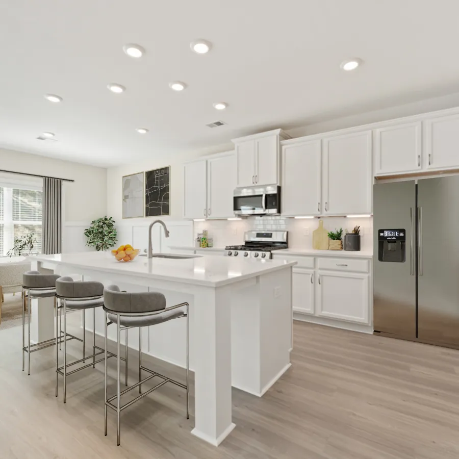 a kitchen with white cabinets