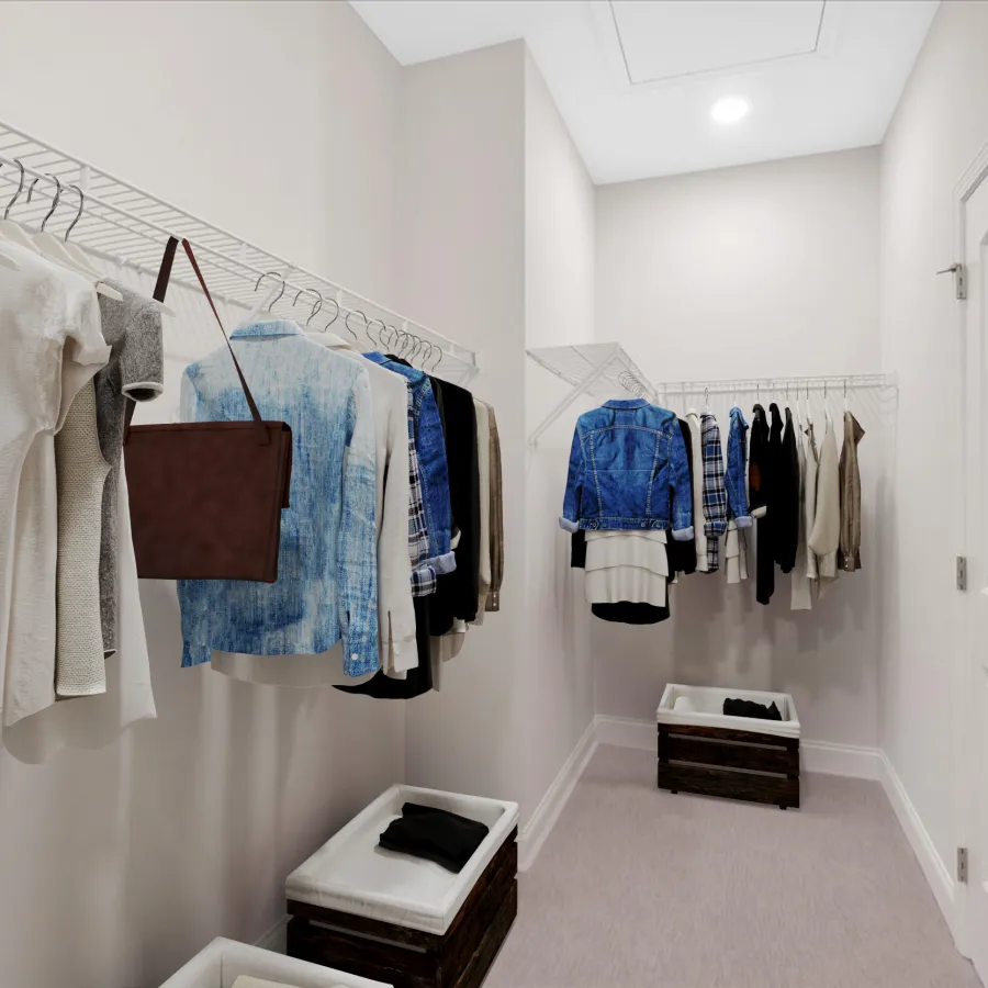 Stylish walk-in closet with organized clothing, wire racks, and storage bins for a tidy appearance.
