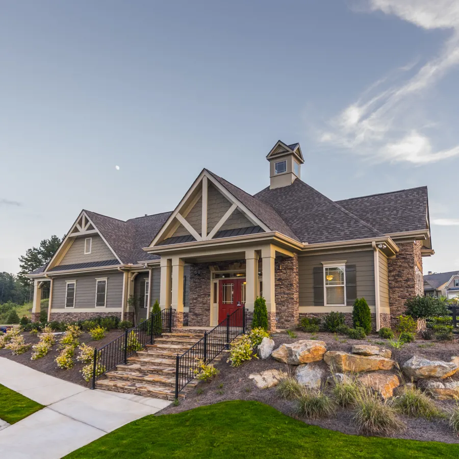 a house with a stone driveway