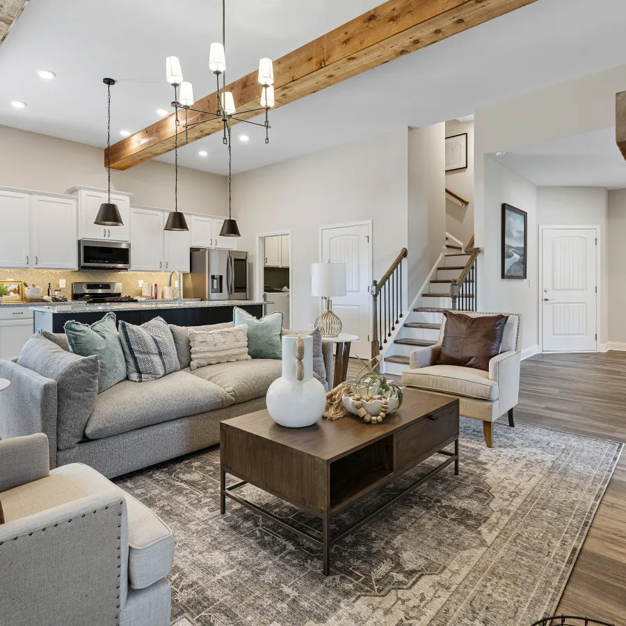 a living room with a staircase