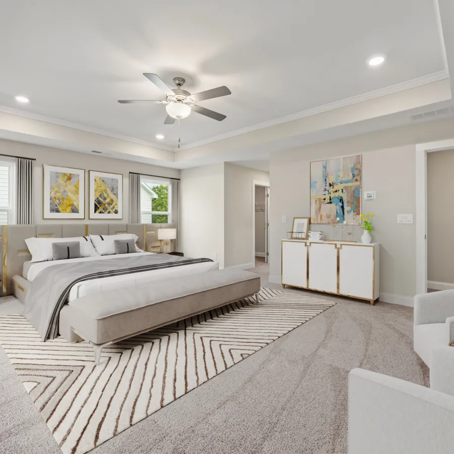 a bedroom with a bed and a fan