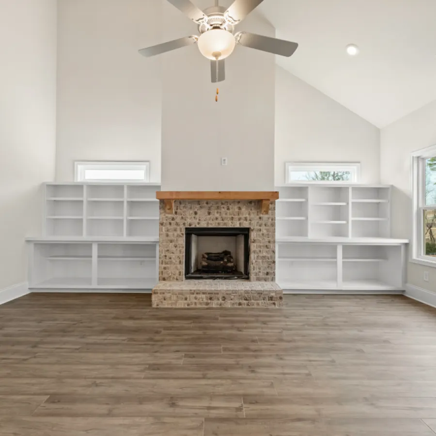 a living room with a fireplace