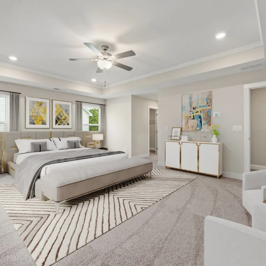 a bedroom with a bed and a fan