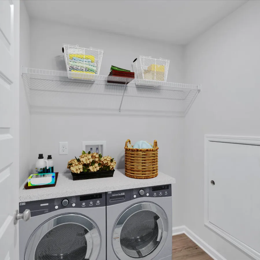Modern laundry room with front-loading washer and dryer, wire shelf, laundry basket, and cleaning supplies.