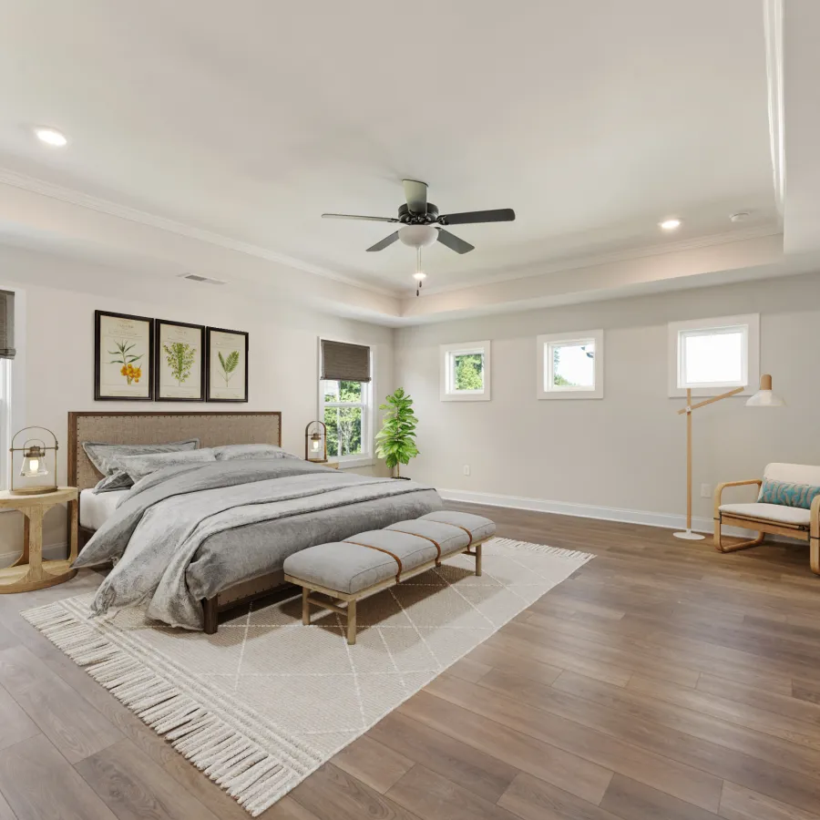 a bedroom with a wood floor