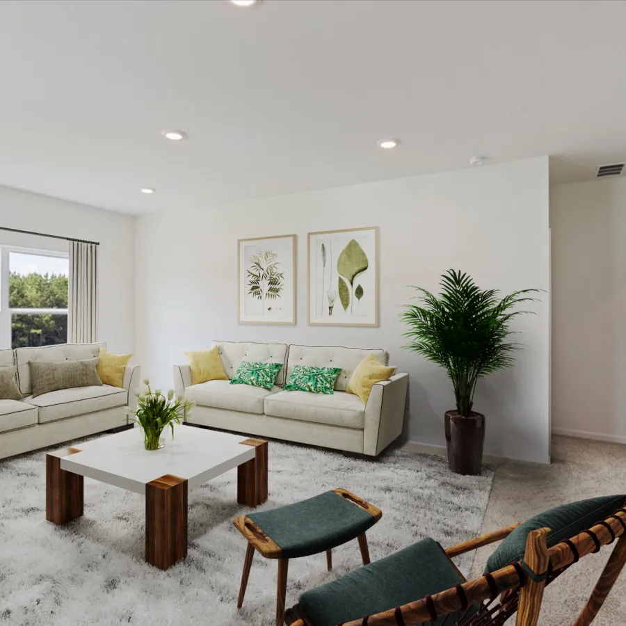 Bright modern living room with two beige sofas, green cushions, wooden coffee table, patterned rug, and indoor plants.