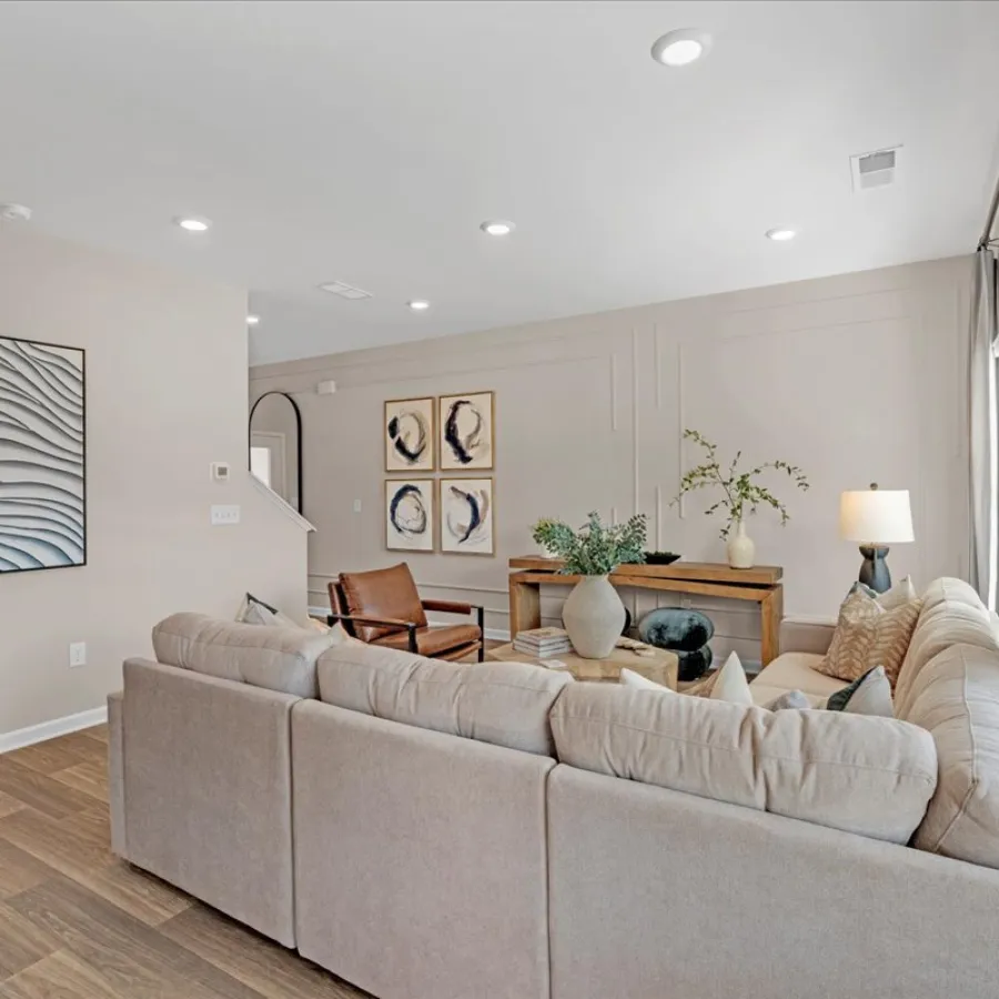 a living room with a couch and a table