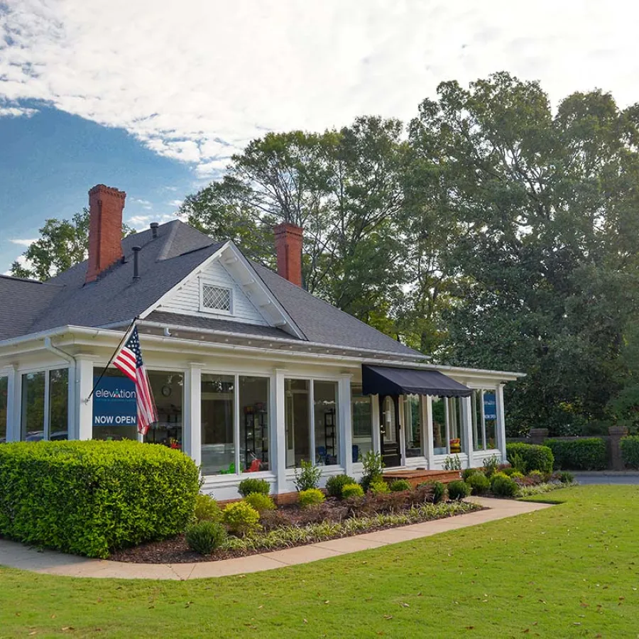 a house with a flag on the front