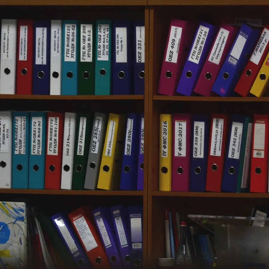 a shelf with many books on it