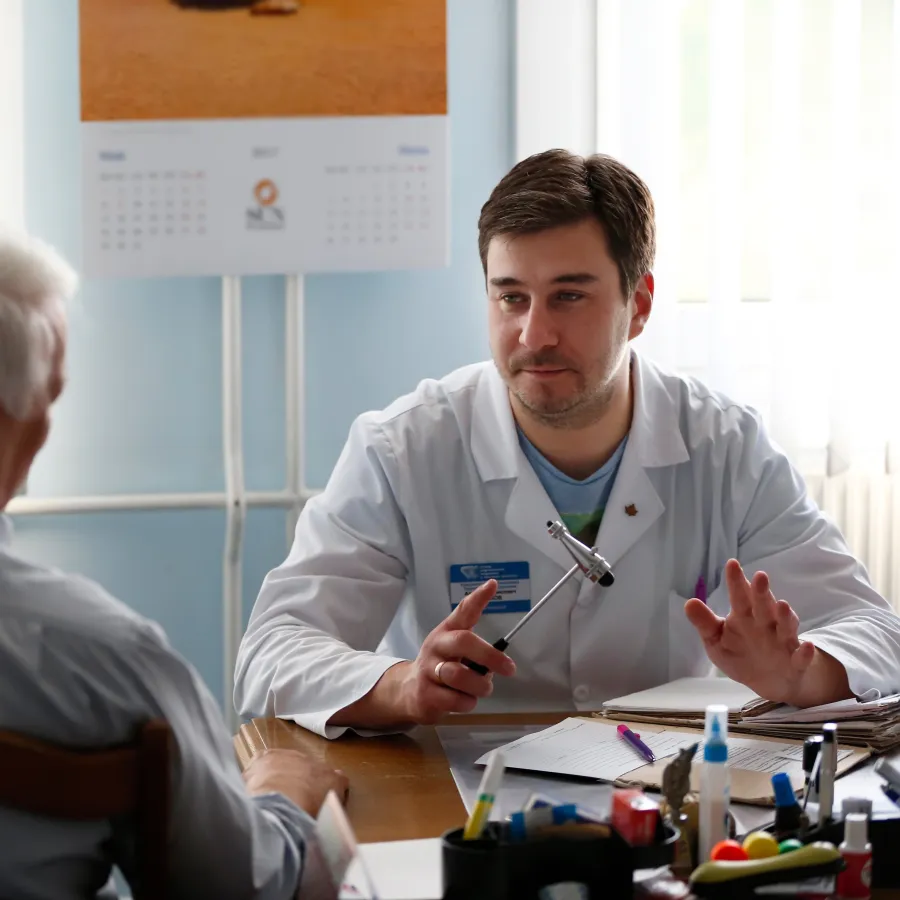 a doctor talking to a patient