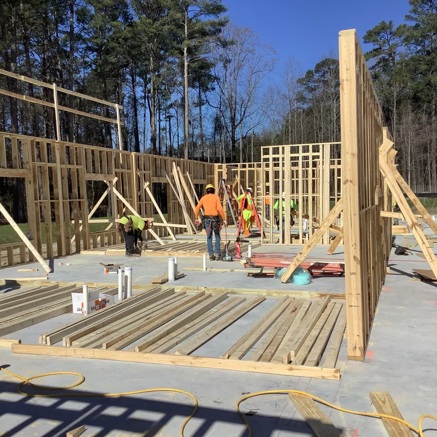 Essayon Construction Group wood framing Crossing Pointe at Christian City Union City GA