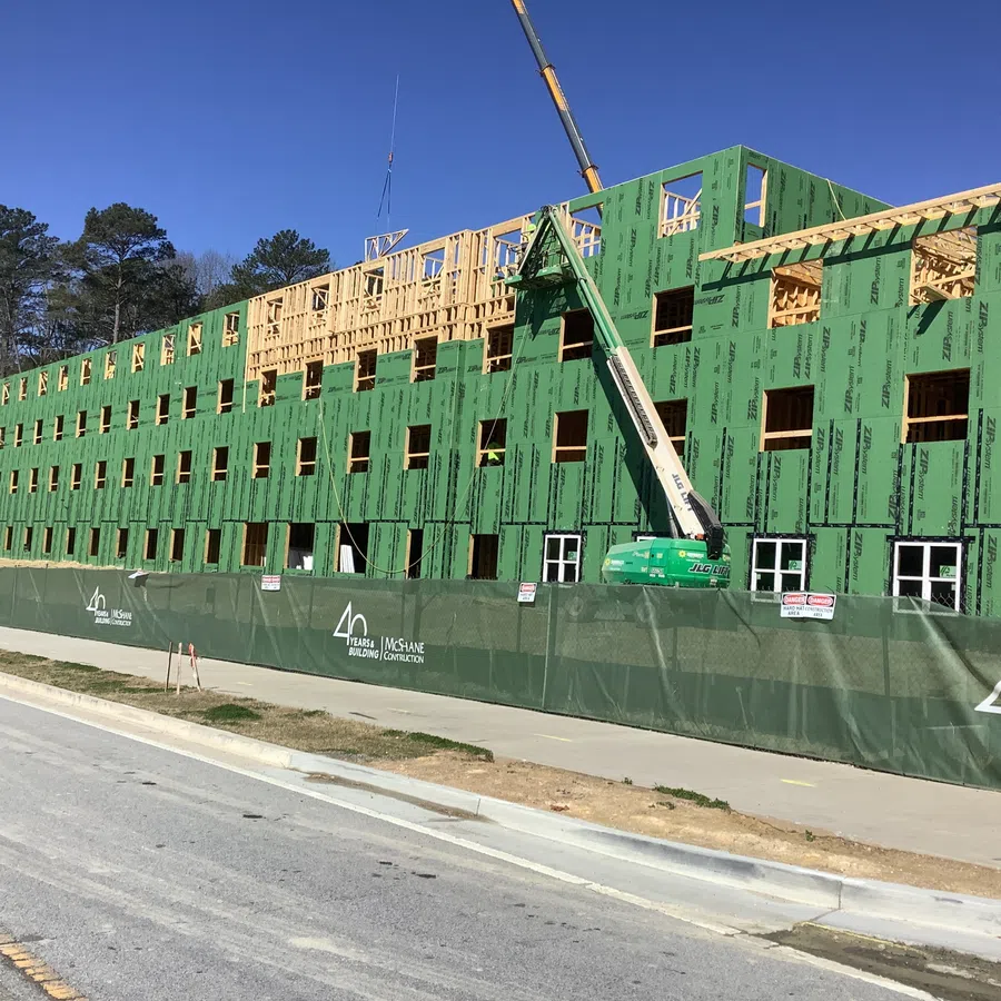 Essayon Construction Group wood framing Crossing Pointe at Christian City Union City GA