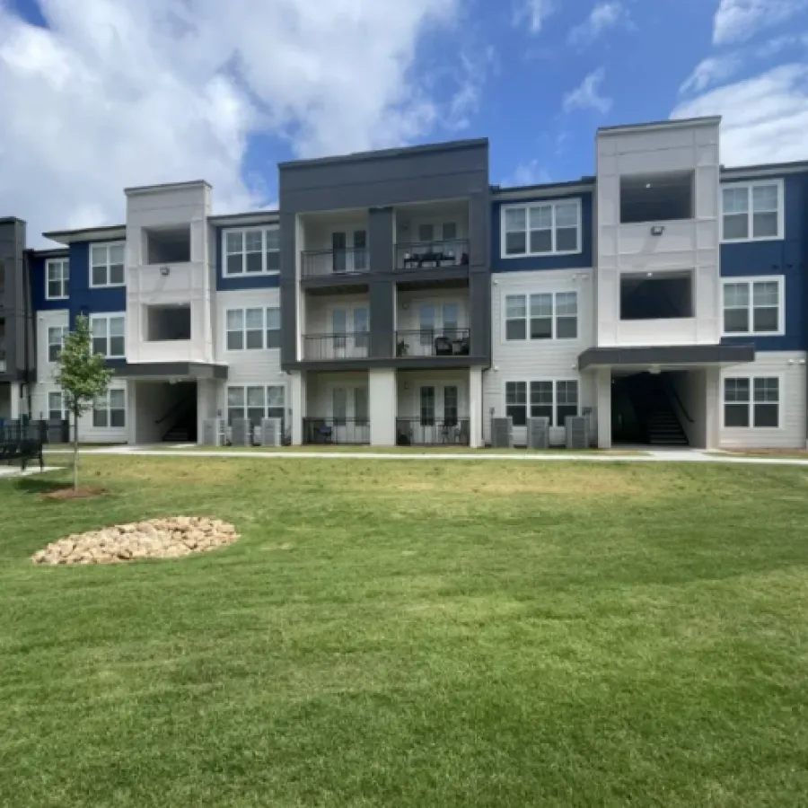 a building with a lawn in front