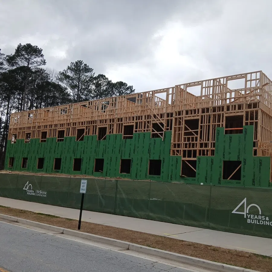 Essayon Construction Group wood framing Crossing Pointe at Christian City Union City GA