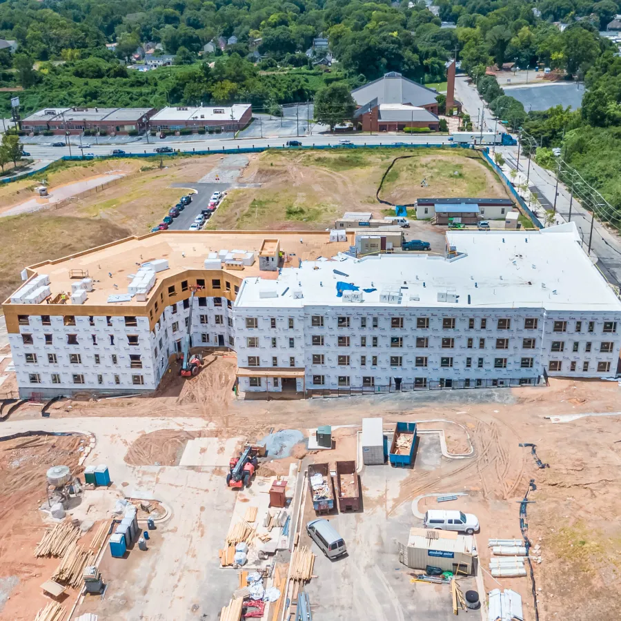 a large building with a parking lot