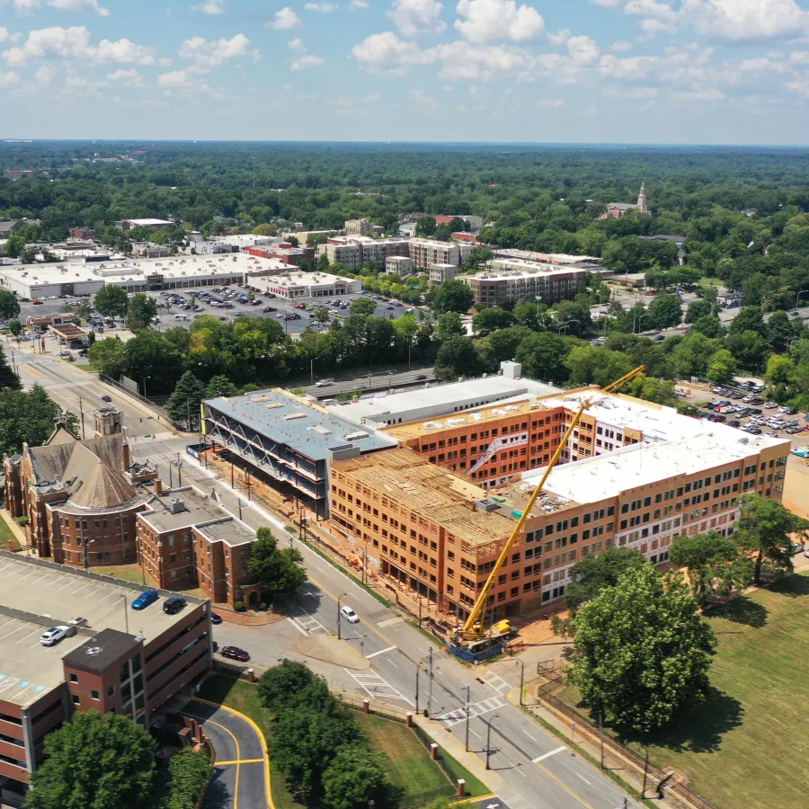 a large building with a parking lot