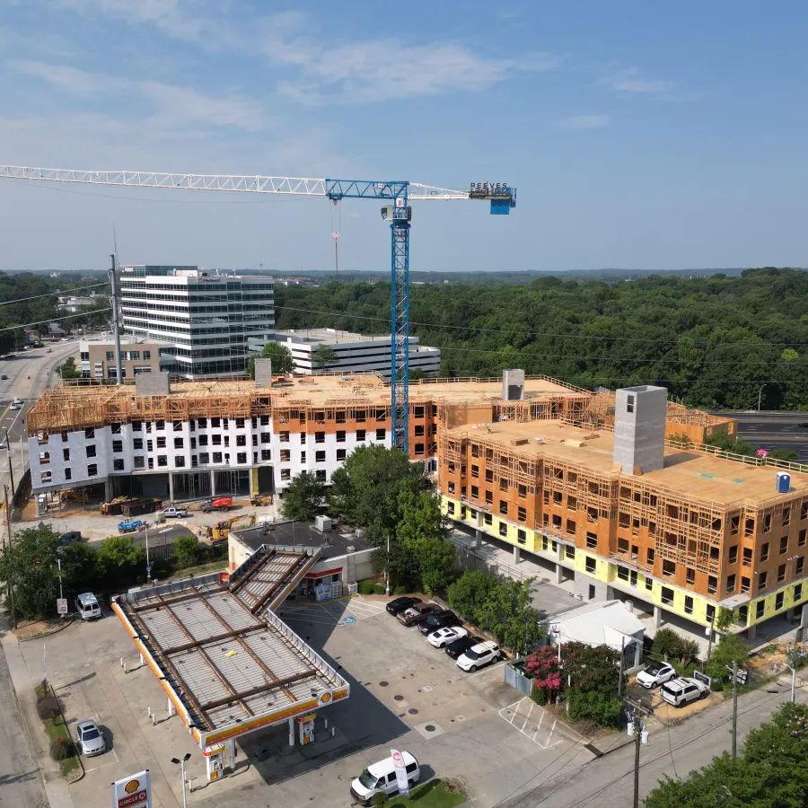 a large building with a parking lot