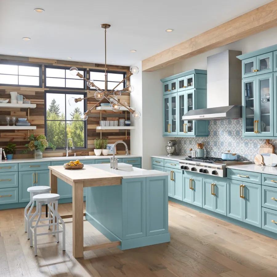 a kitchen with blue cabinets