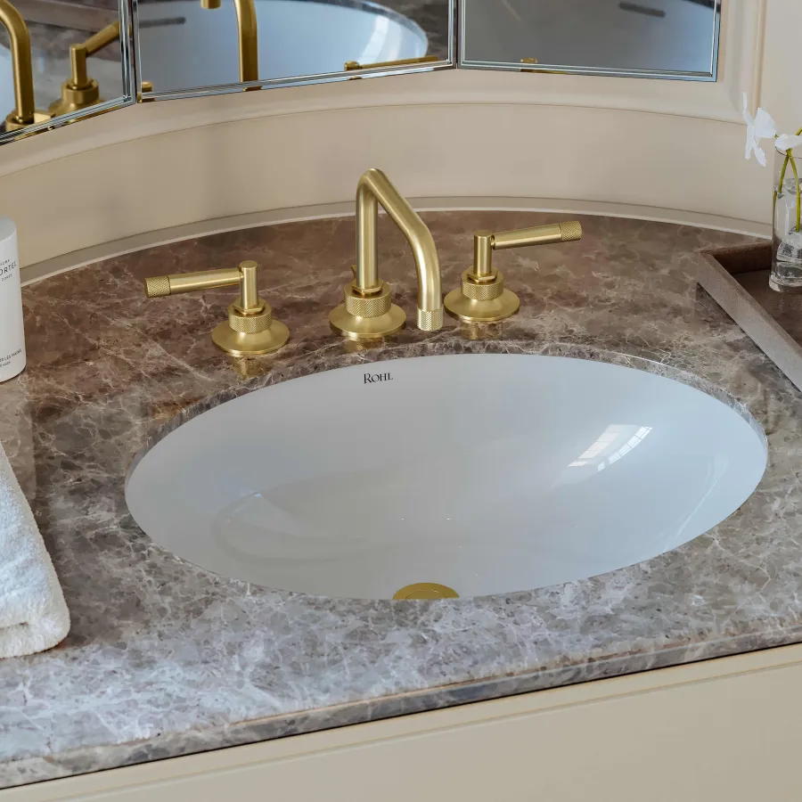 a bathroom sink with a towel