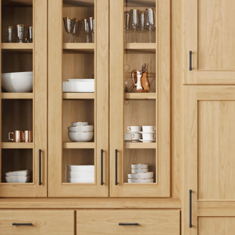 a kitchen with wooden cabinets
