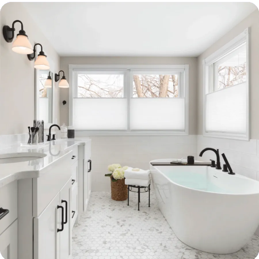 a bathroom with a tub and sink