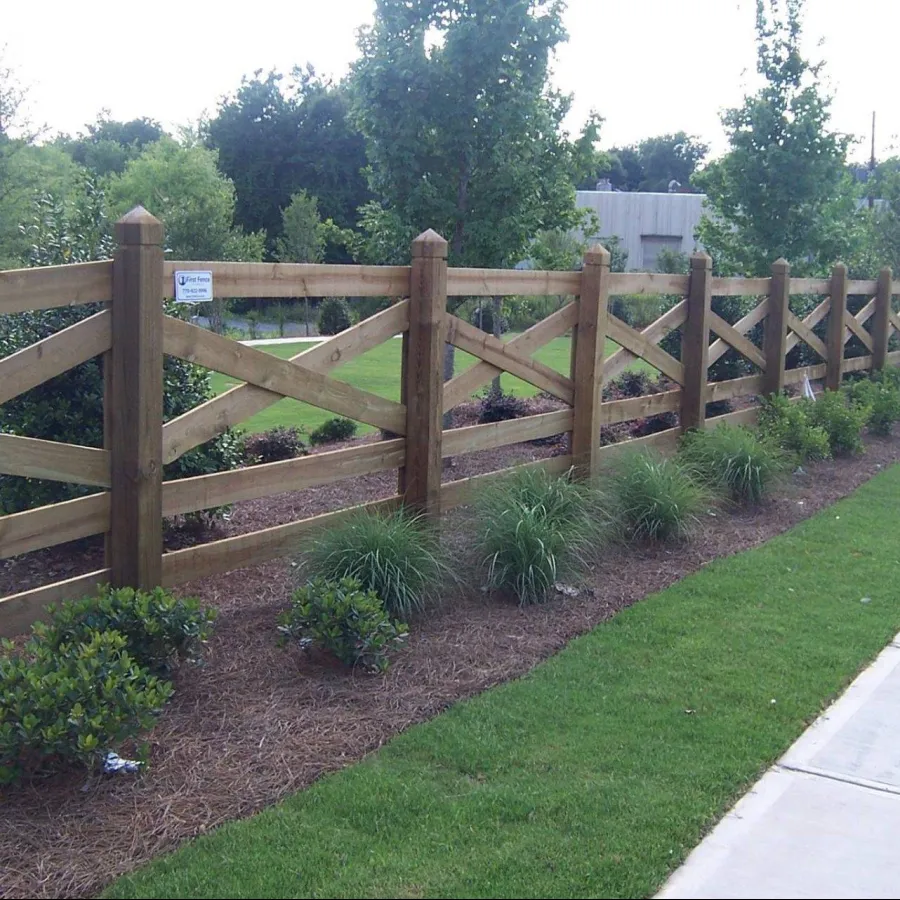 a wooden fence in a garden