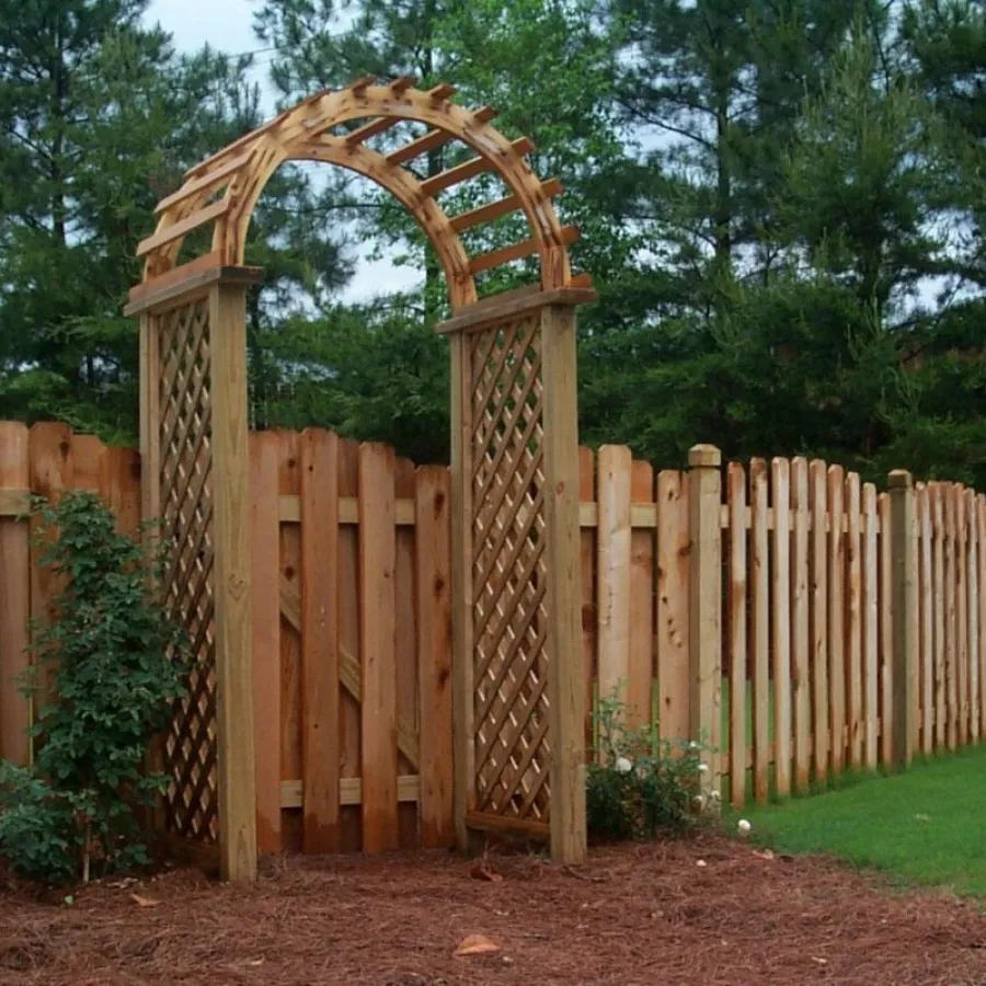 a wooden fence with a wheel