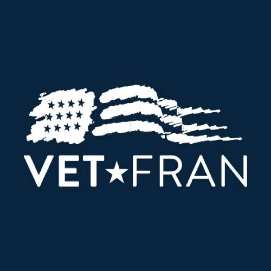 VetFran logo with stylized American flag and white text on dark blue background