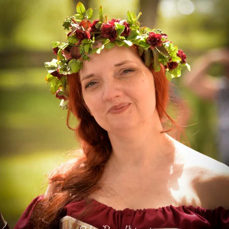 a woman with flowers on her head