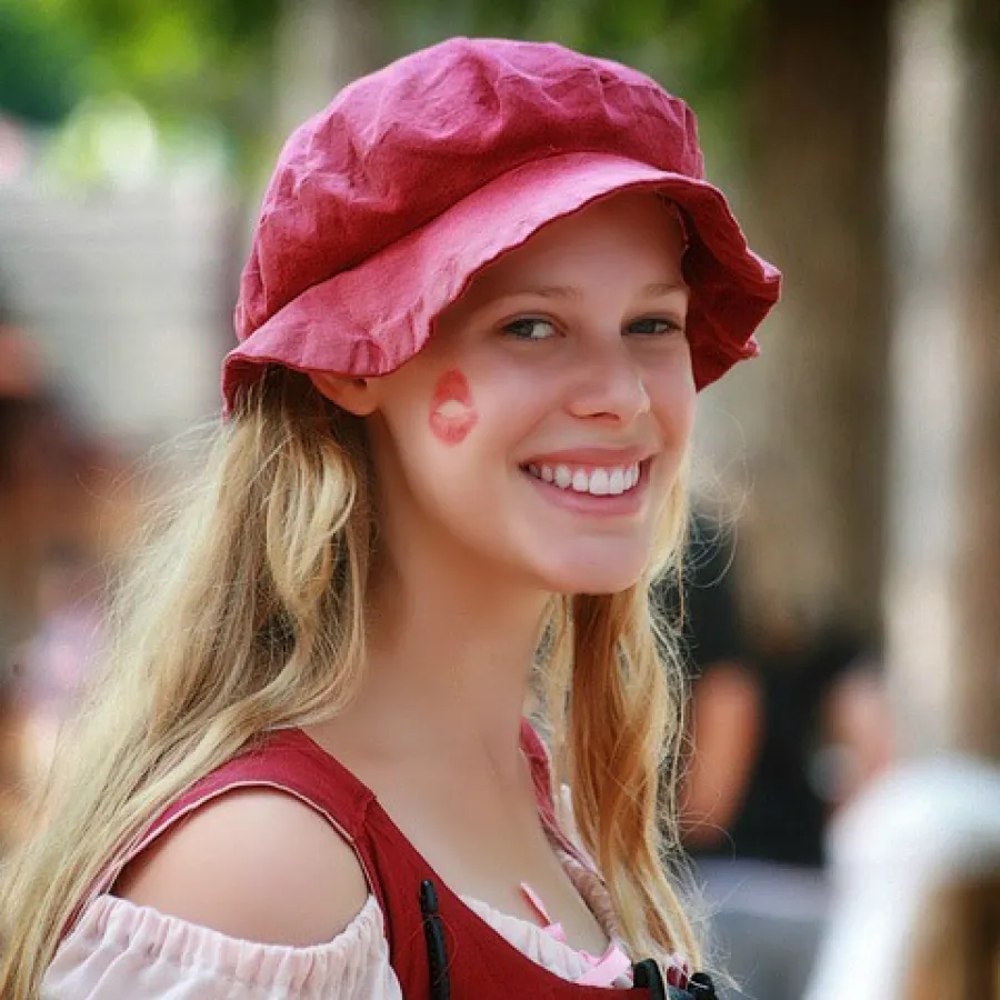 a person wearing a pink hat