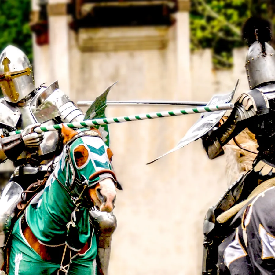 two people in jousting clothing
