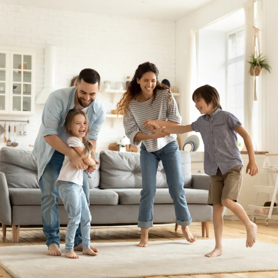a group of people standing on a couch