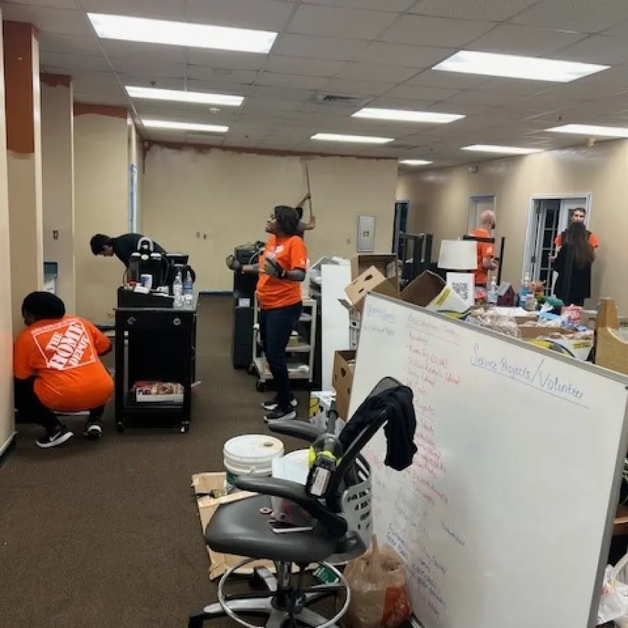 a group of people in an office