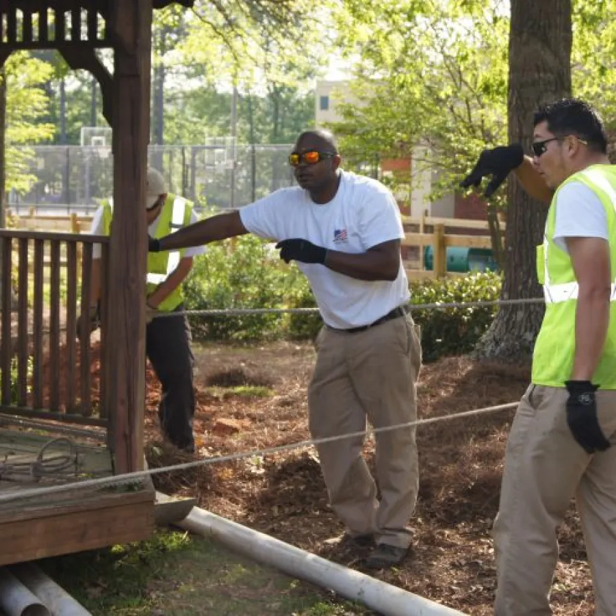 a group of people working on a construction site