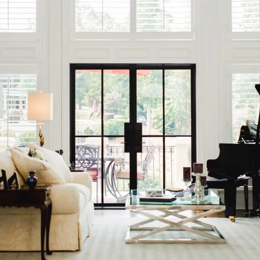 Living room with black iron and glass modern patio door