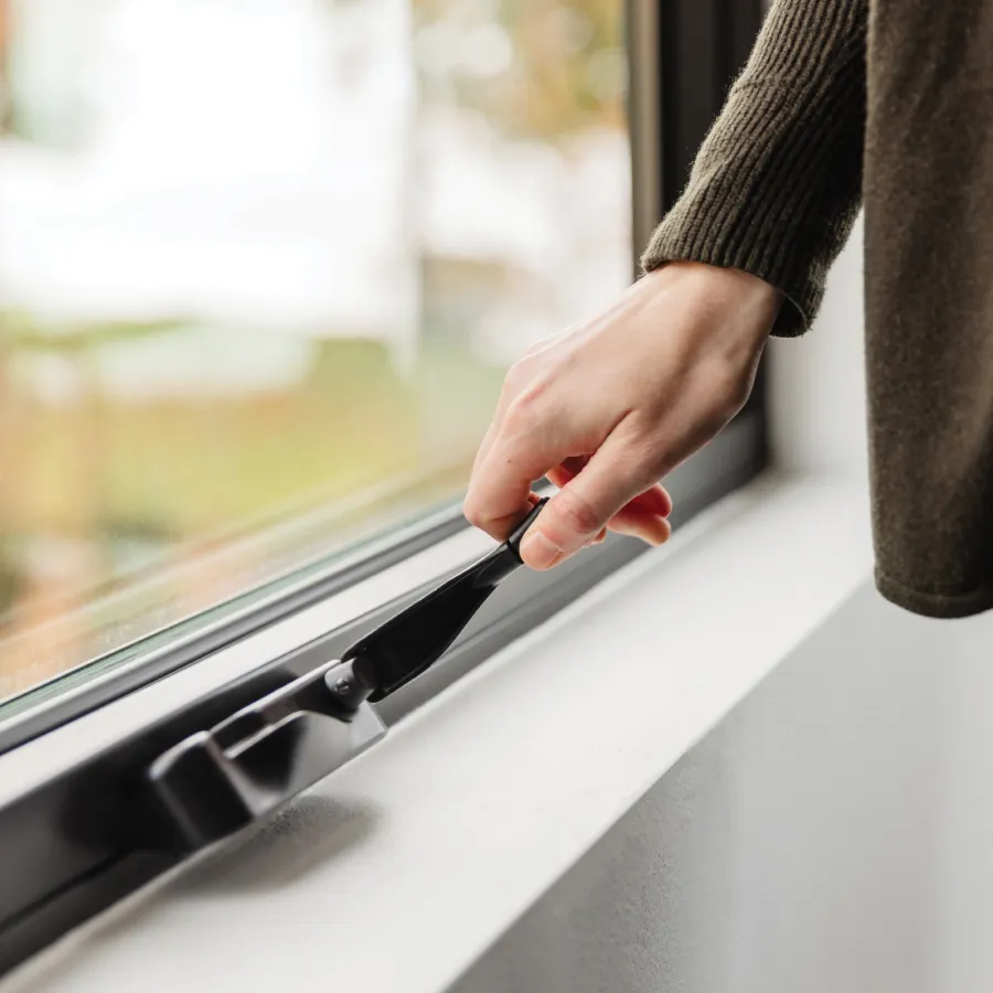 Turning the handle to open awning windows