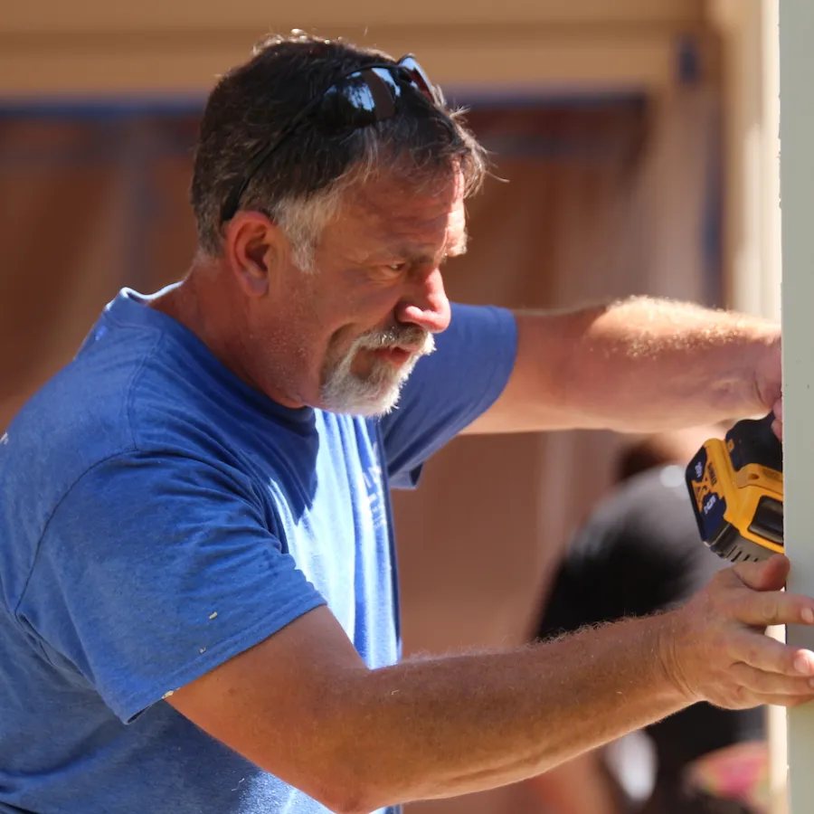 a man holding a toy gun