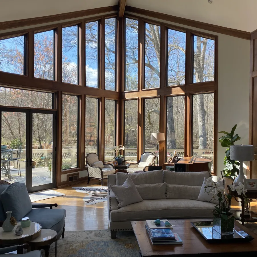 a living room with large windows