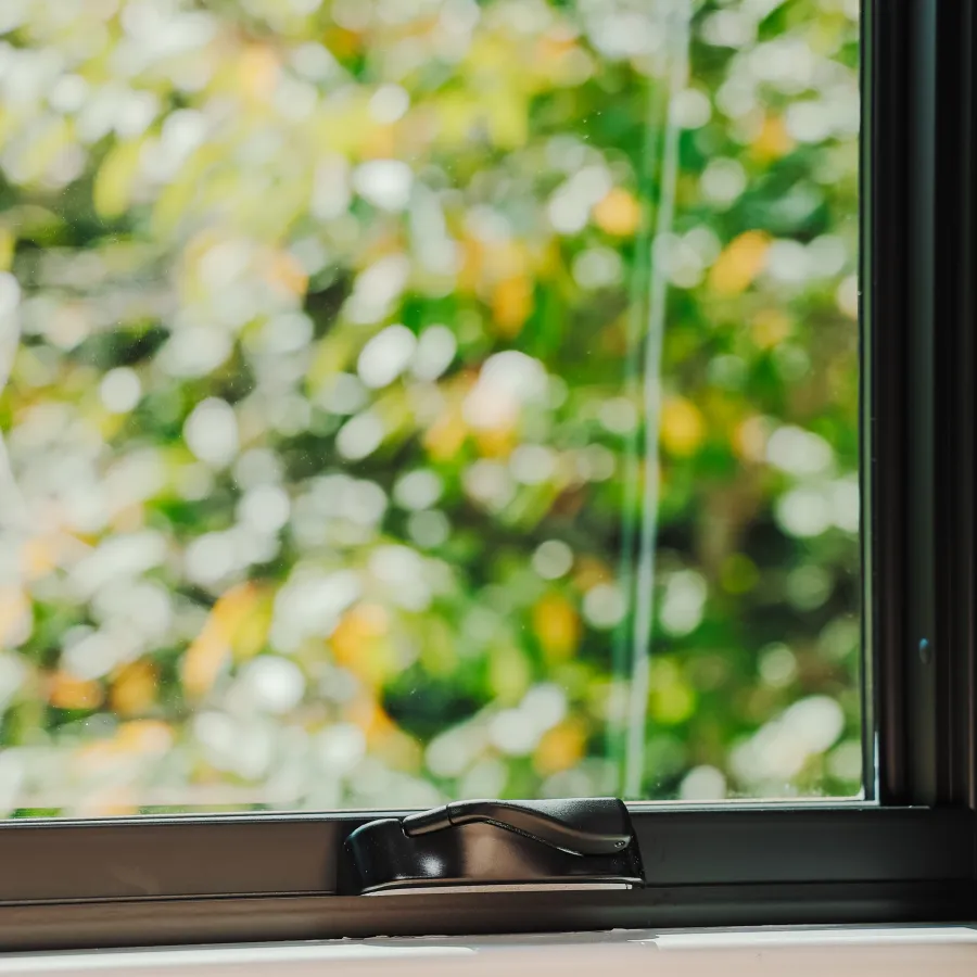a window with a black object in front of it