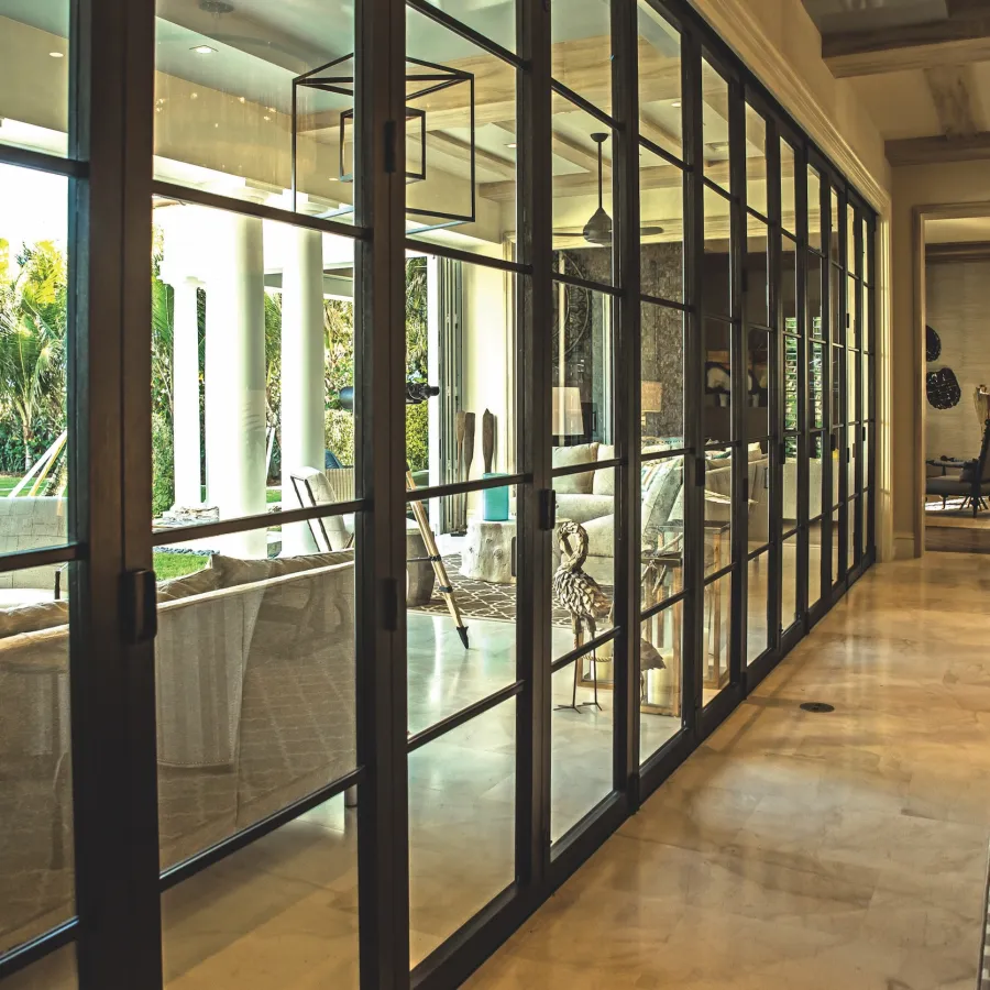 Euro-Wall Folding Patio Doors Connect Living Room and Backyard